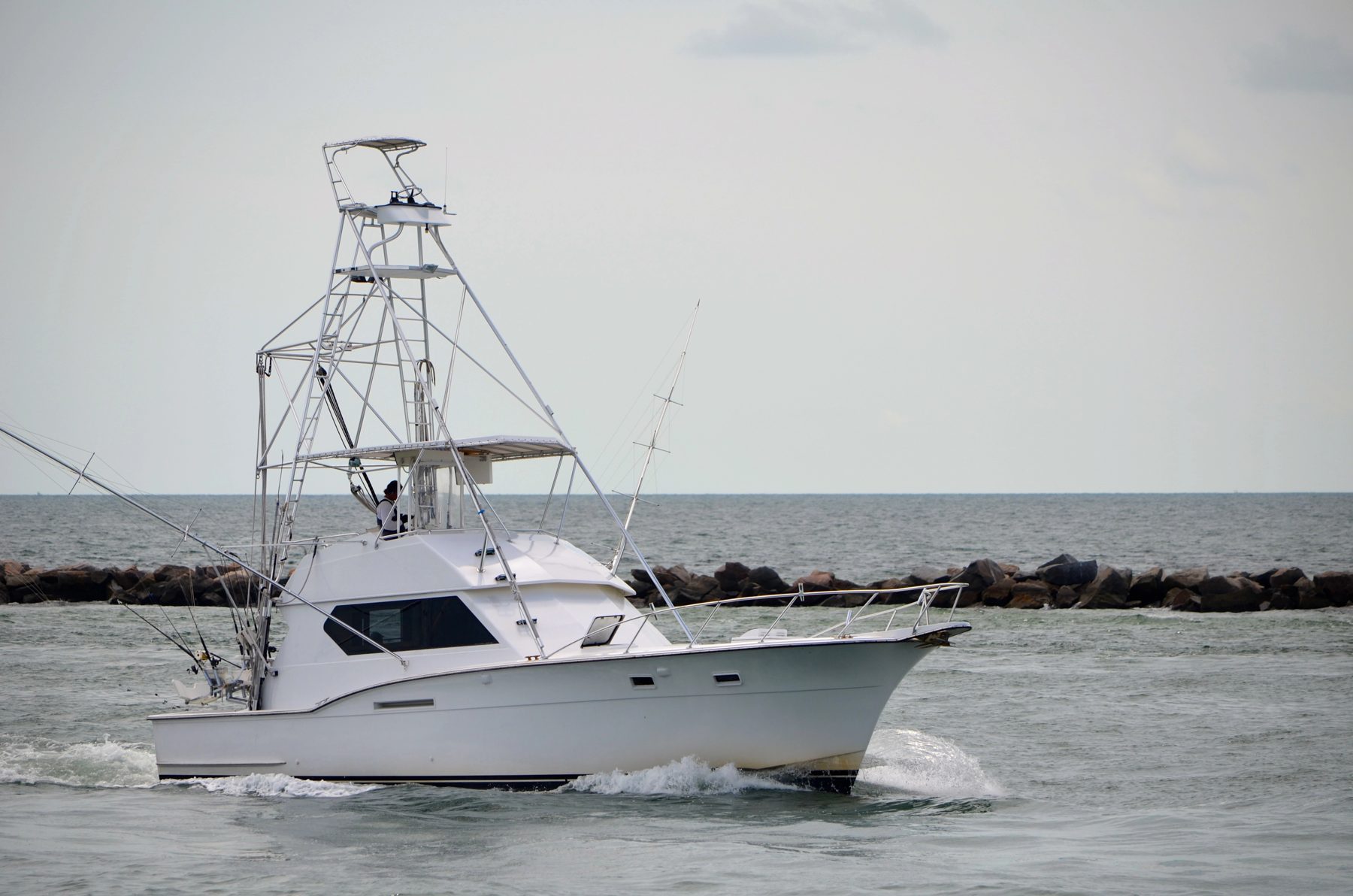 Sport fishing charter boat heading out to sea, Costa Rica