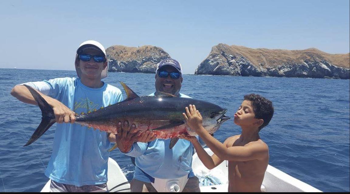 Anglers with a tuna catch on a Pacific fishing trip in Costa Rica