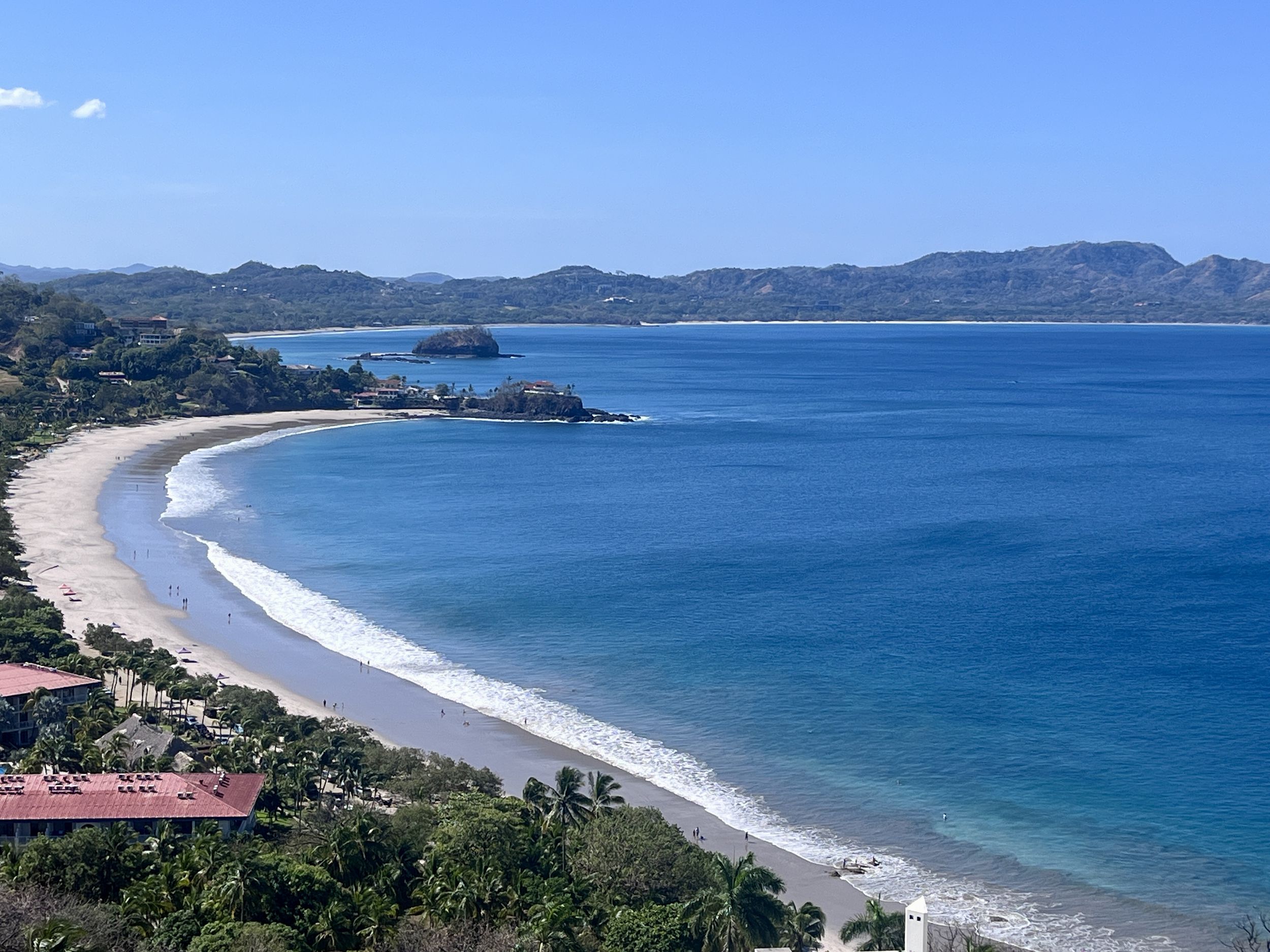 Aerial view of the crescent beach at Playa Conchal and Flamingo, Guanacaste