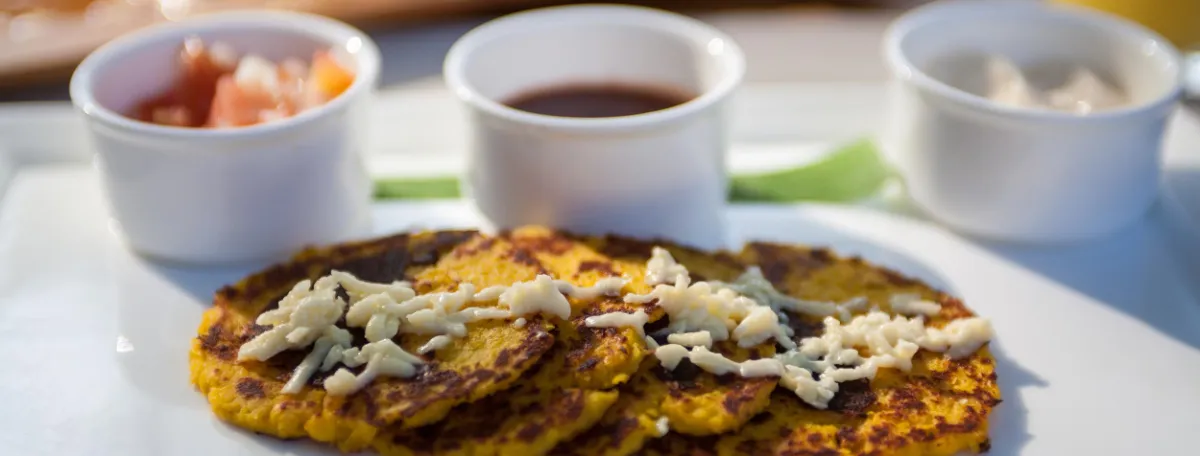 Chorreadas with fresh cheese on a plate in Costa Rica