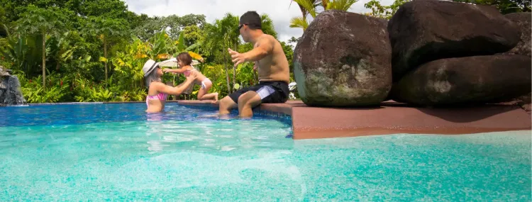 Children playing in a hotel swimming pool in Costa Rica